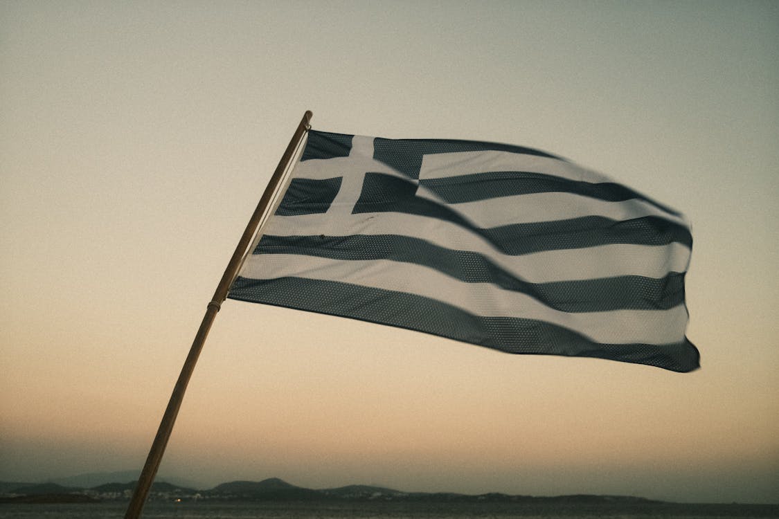 Free Close up of Greek Flag at Dusk Stock Photo